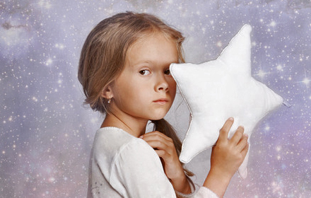 Child holding star